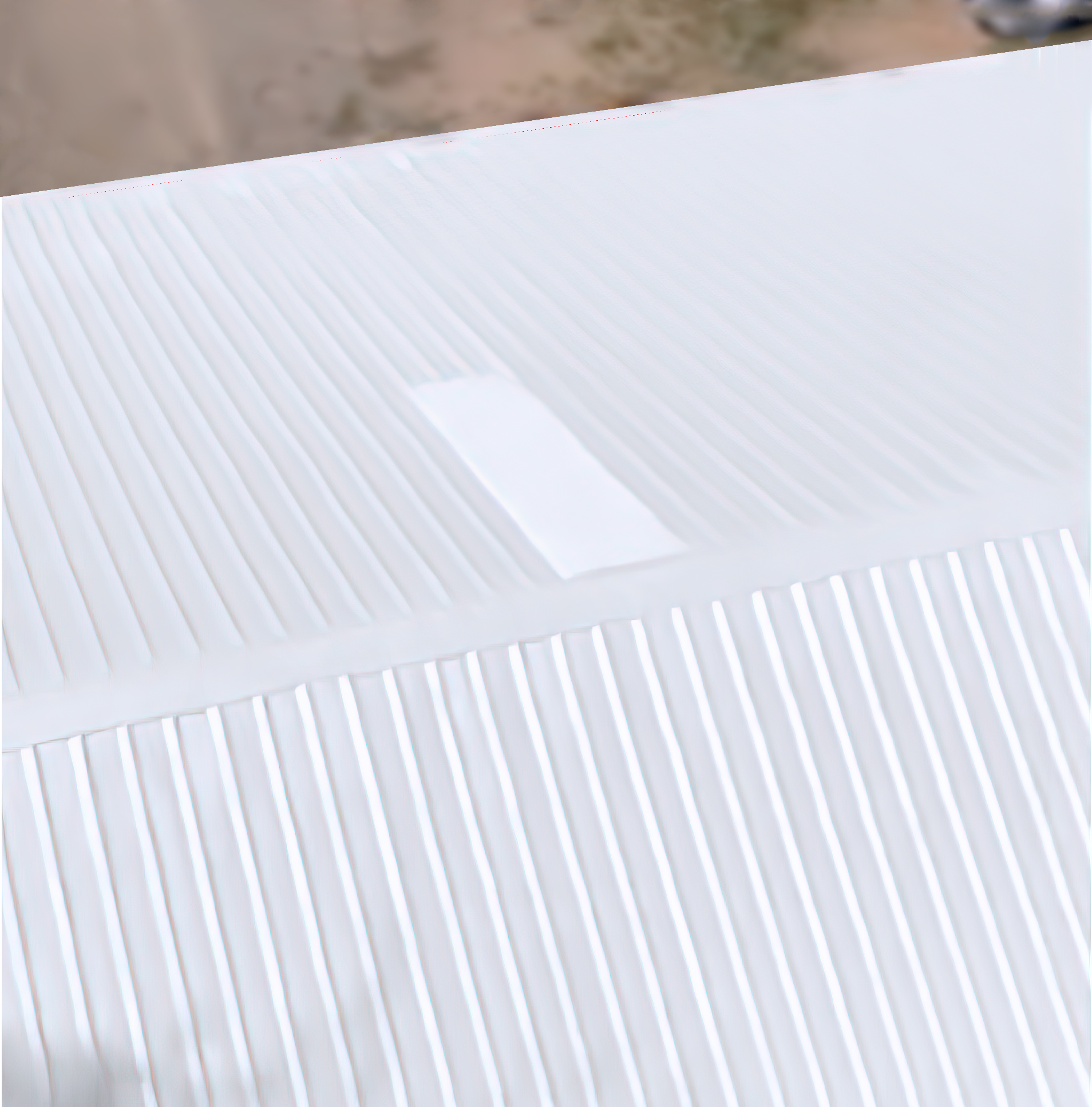 A picture of a metal roof after Polyurethane Insulated Roofing is applied.